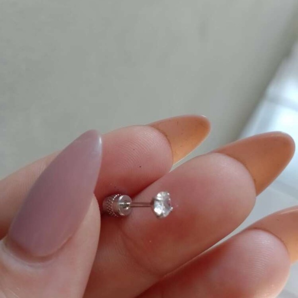 Add a touch of elegance with these stunning silver stud earrings. Perfect for an - Picture 3 of 5